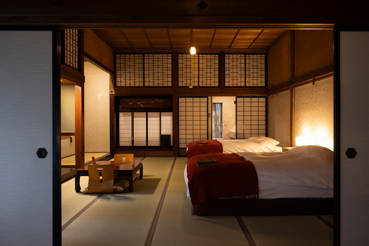 Guest rooms that preserve the warmth of wood while offering modern comfort.