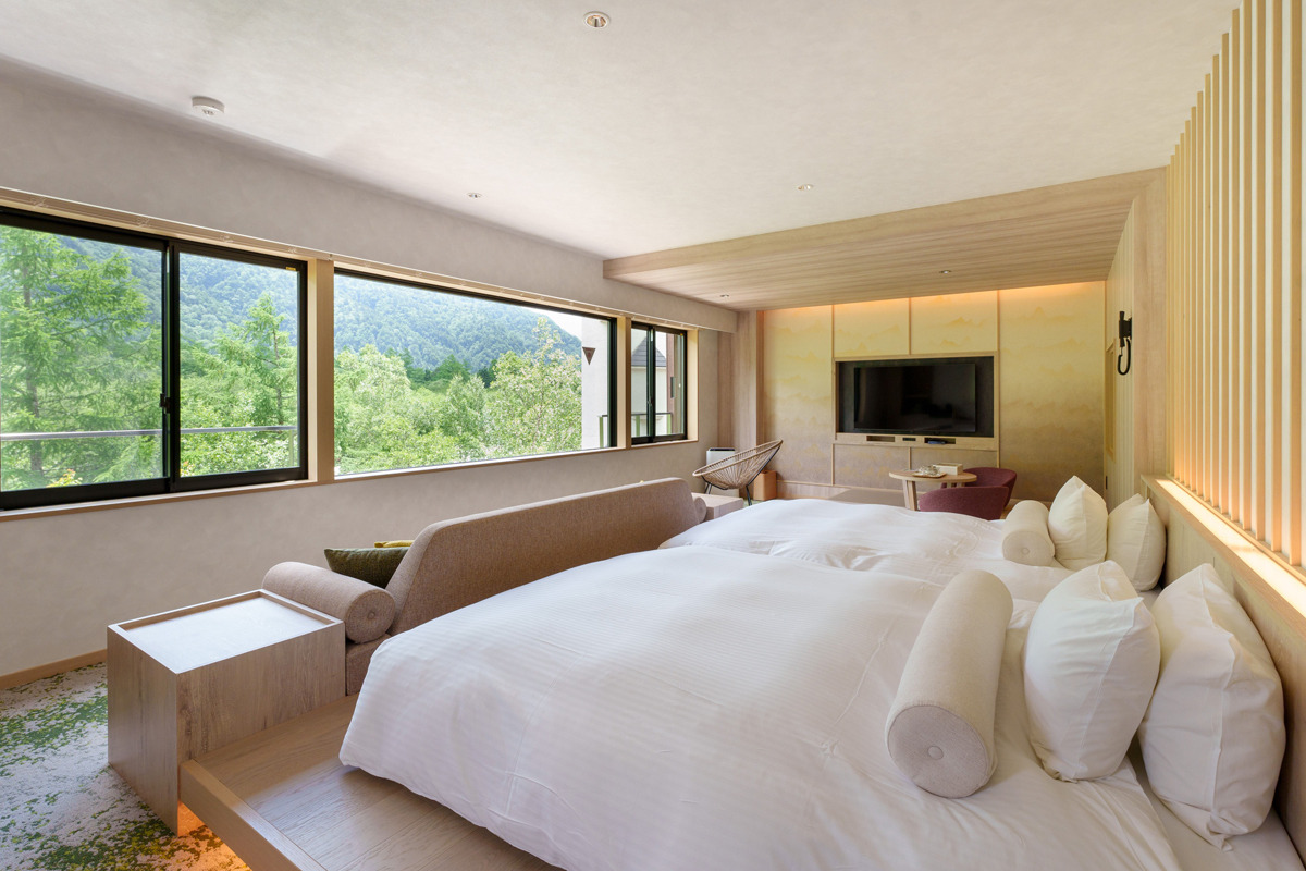 Panoramic views of the sky and mountains unfolding right outside your room.