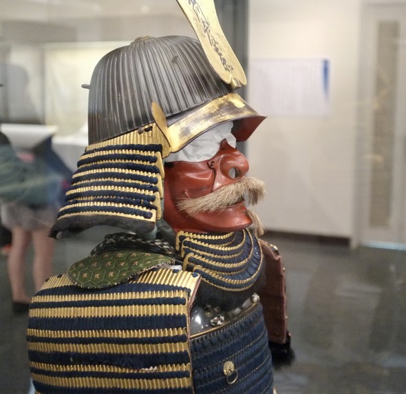 Samurai armor with a red face mask.