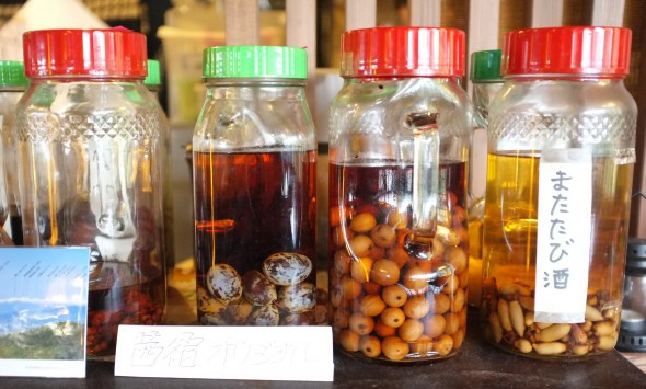 Homemade liquors on display in the dining hall