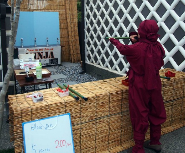 Ninja blowgun game. You can also rent a ninja outfit, like this person here!