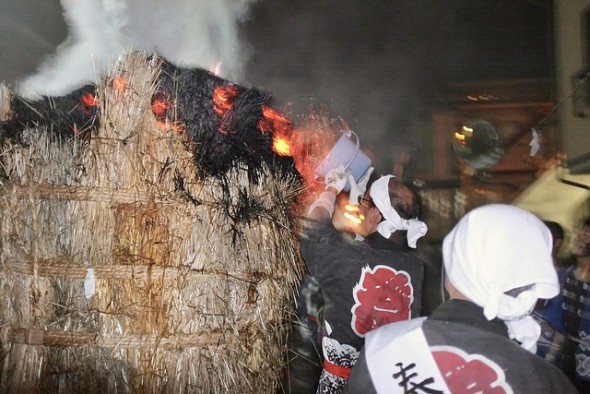Pouring buckets of water on the torch