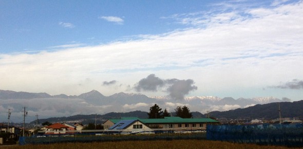 The lower mountains up front are still snow free
