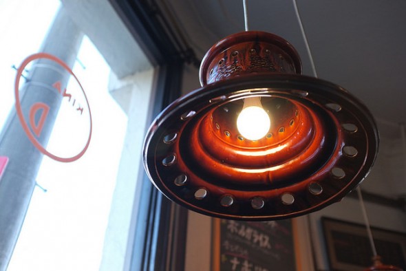 Spiffy ceramic lights hanging about the tables