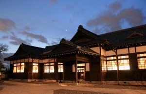 The court building lit up at night