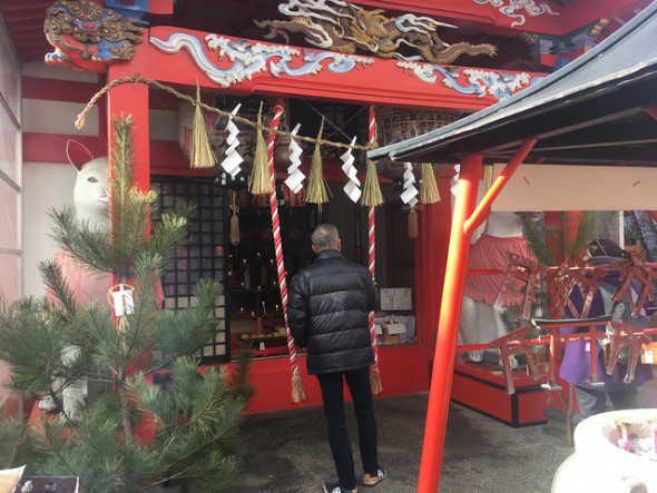 A visitor at Kasamori Inari Shrine.