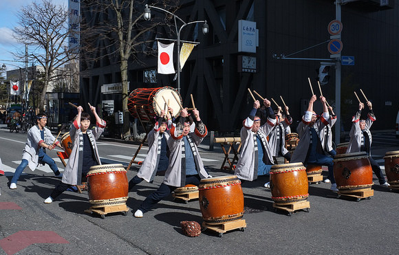 A taiko group performing in the street