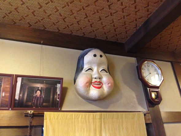 An old "otafuku" mask on the wall